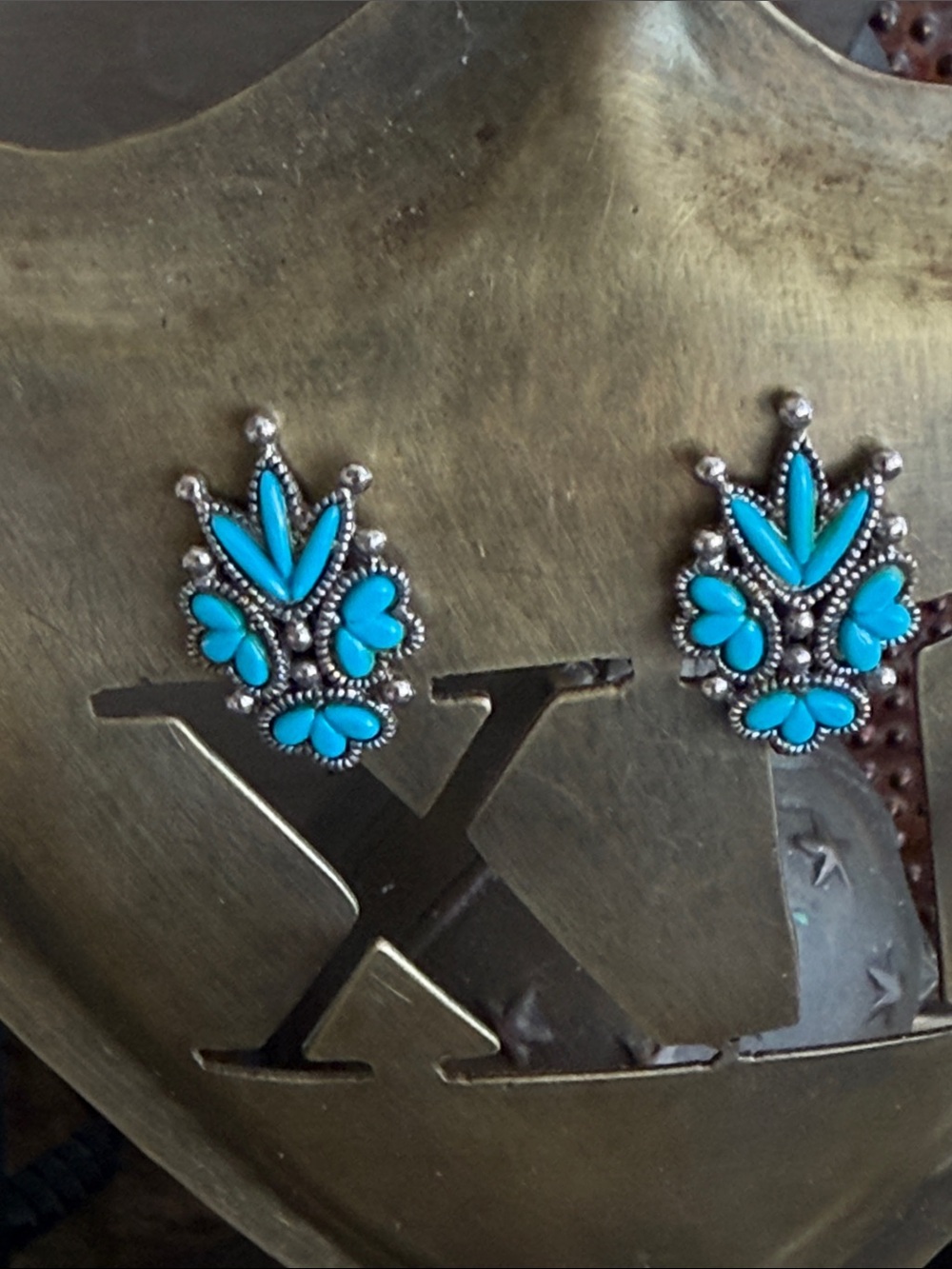 Turquoise colored only Floral clip on earrings